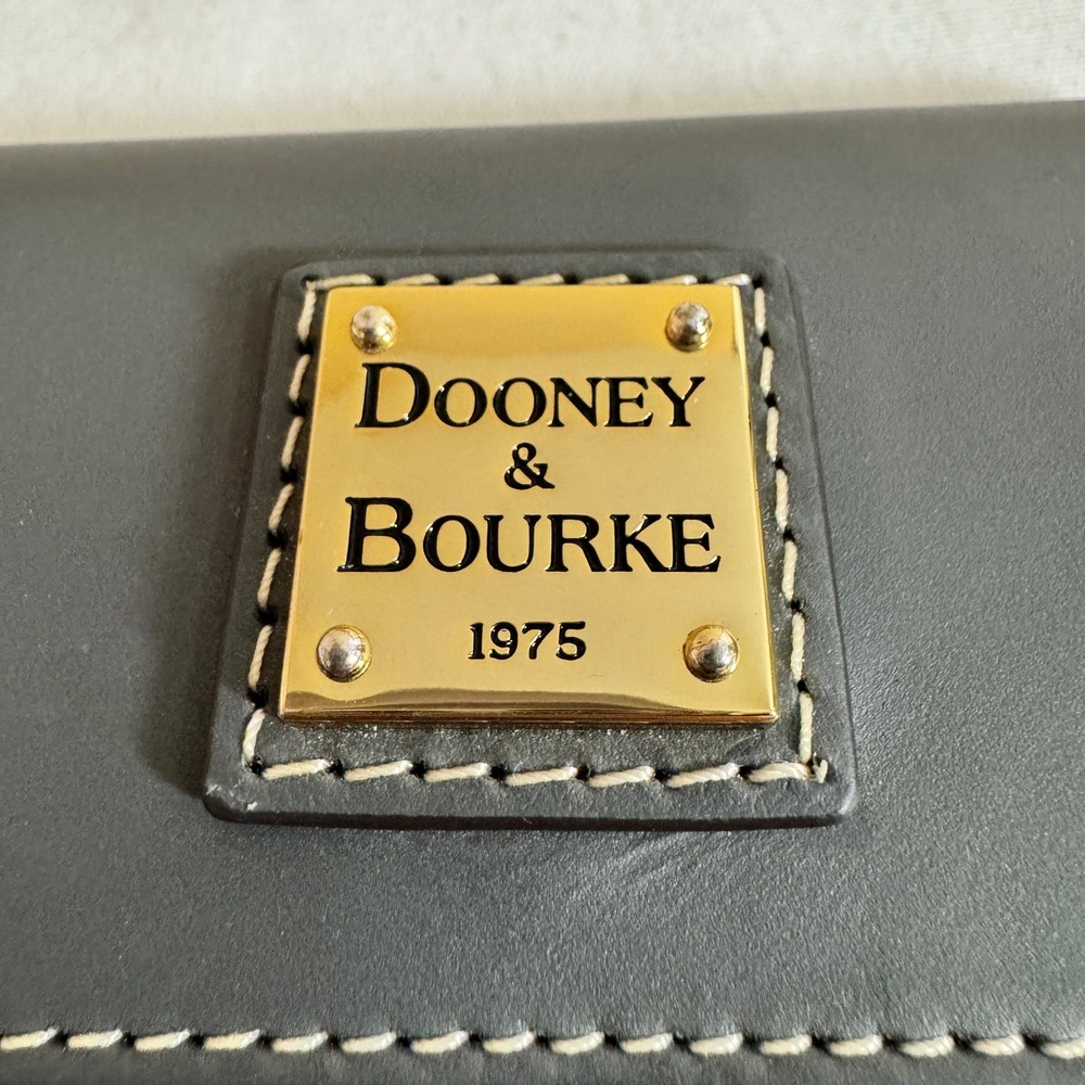 Dooney & Bourke Grey Leather Trifold Wallet Gold Logo Plaque Striped Lining